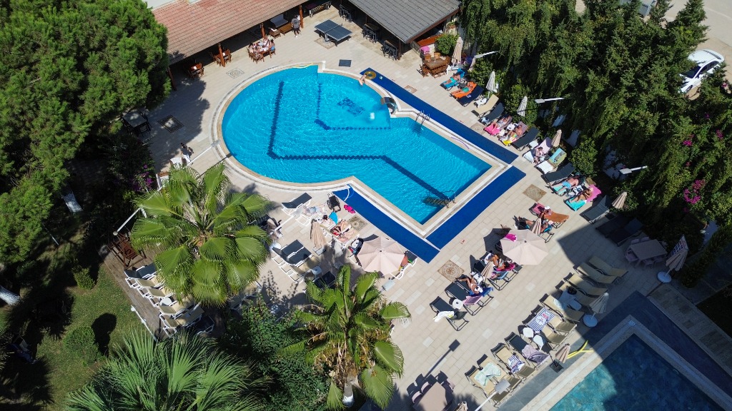 Opus Apart Aerial Drone Pool and Lounge View